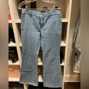 NWOT Express 70s Flare Mid Rise Jeans size 6R
Brand new never worn.